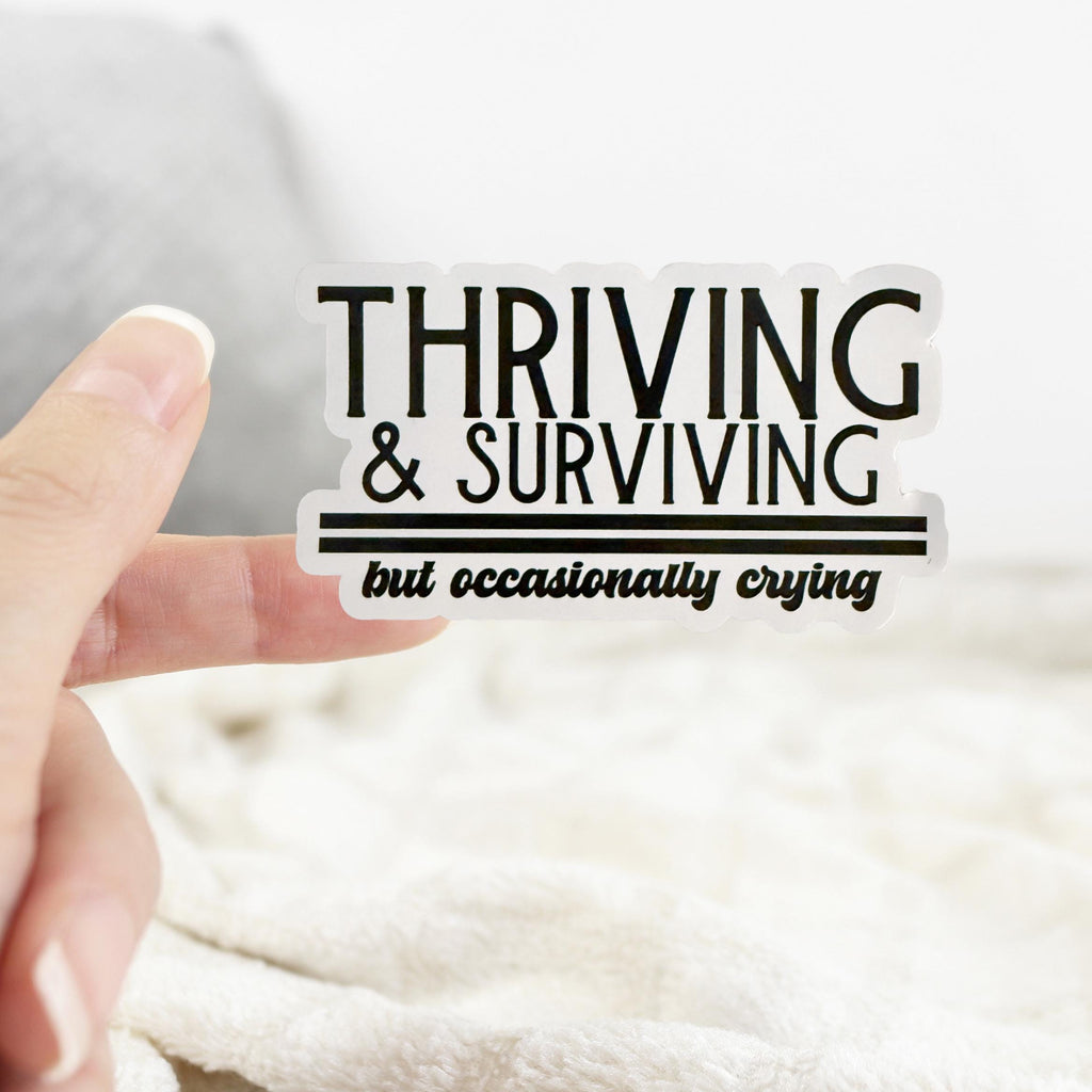 Thriving and Surviving But Occasionally Crying Sticker