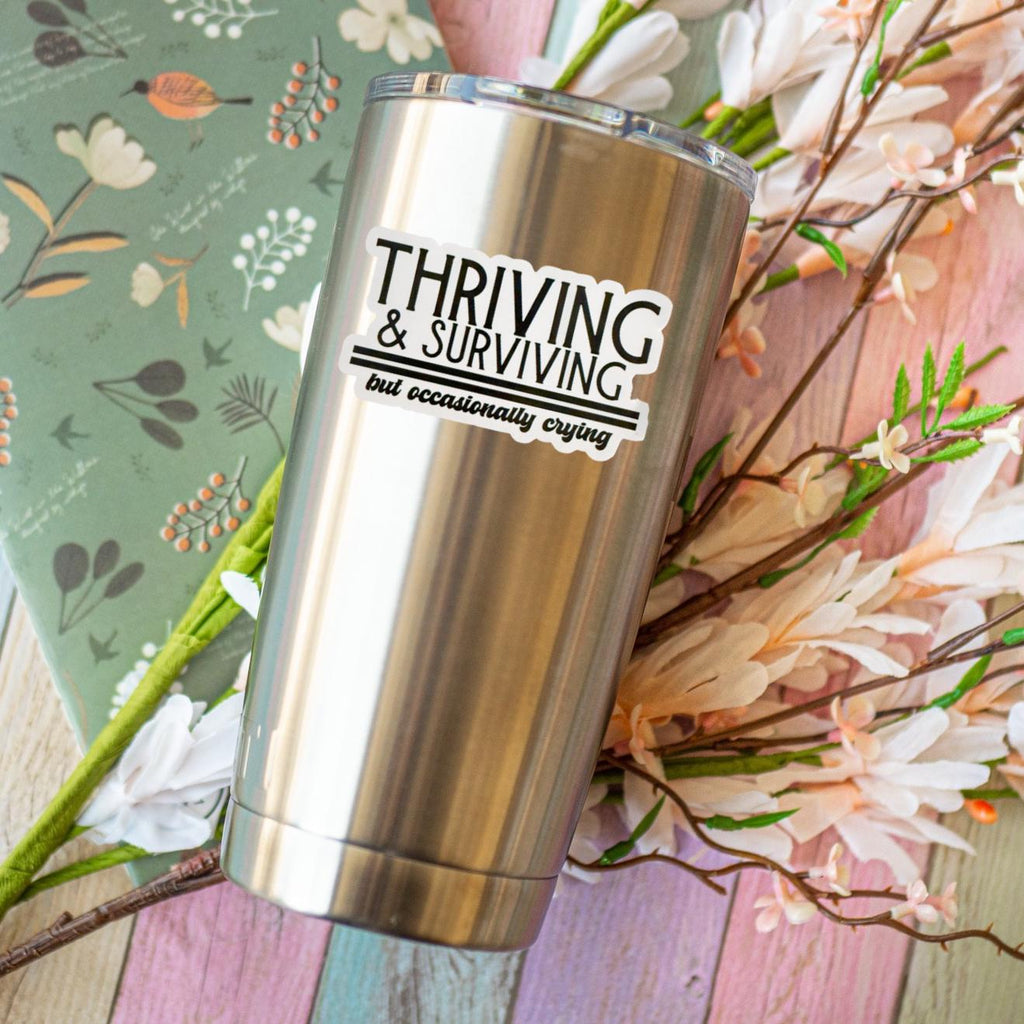 Thriving and Surviving But Occasionally Crying Sticker